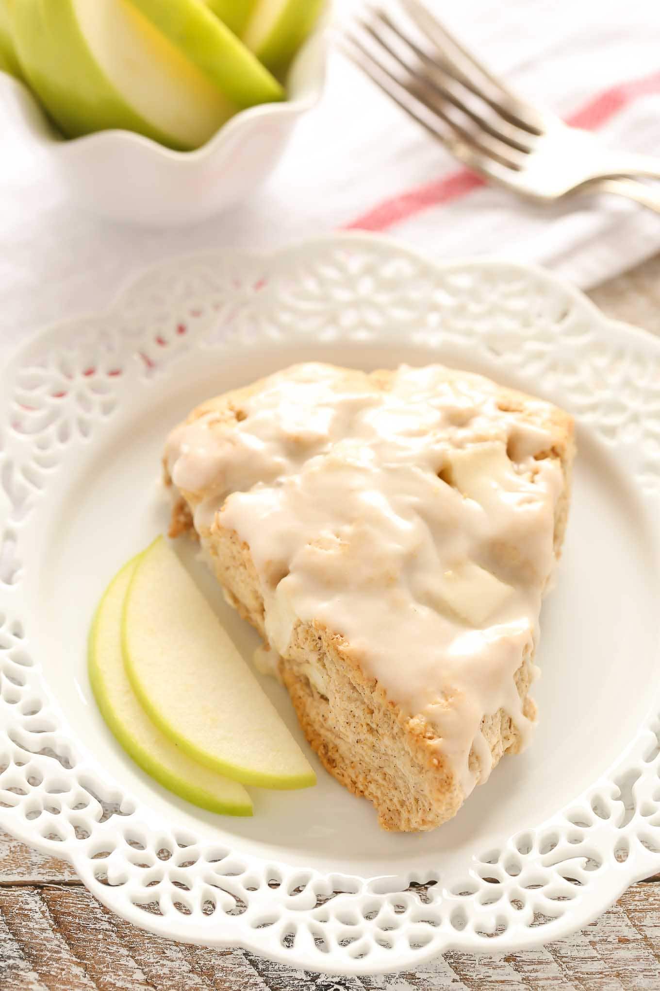 These Apple Cinnamon Scones are filled with chopped apple, spices, and incredibly soft and tender. The perfect treat for breakfast or brunch!