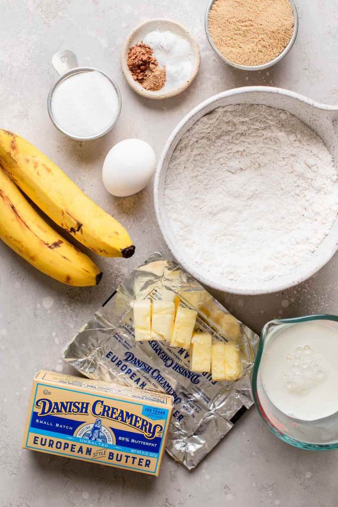 An overhead view of the ingredients needed to make a banana cupcake recipe. 