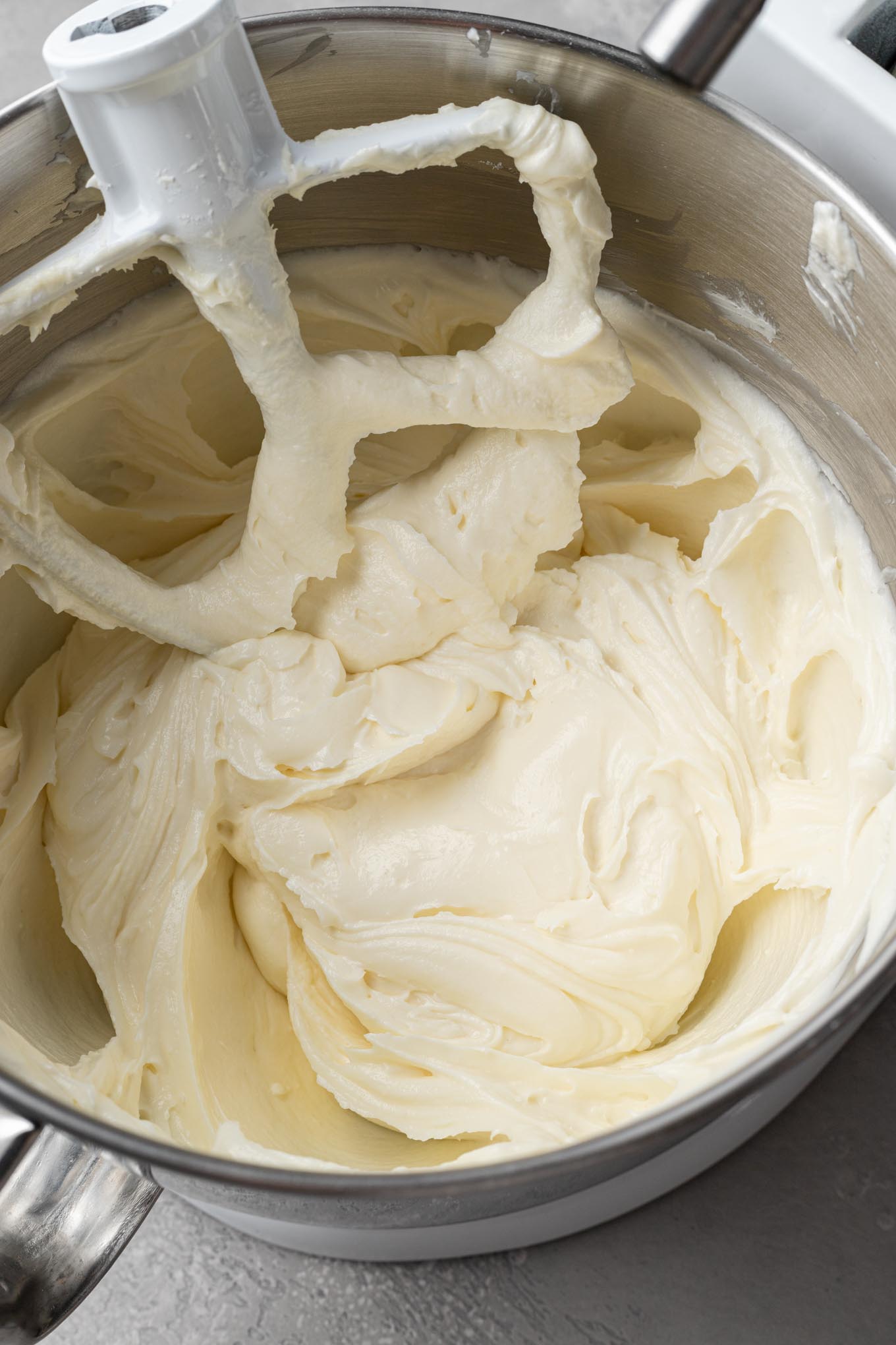 Beaten cream cheese and sugar in a stand mixer.