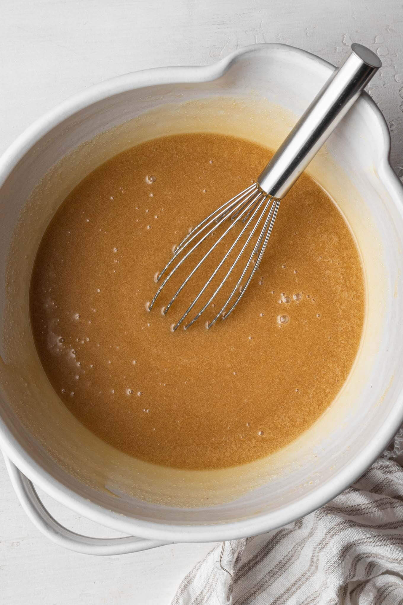 An overhead view of the wet ingredients needed to make blondies.