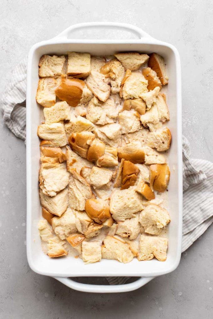 Finished bread pudding that's soaking before it goes into the oven.