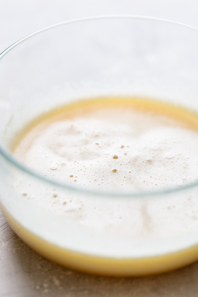 Brown butter in a glass bowl that has been chilled and ready to use in the cookie dough.