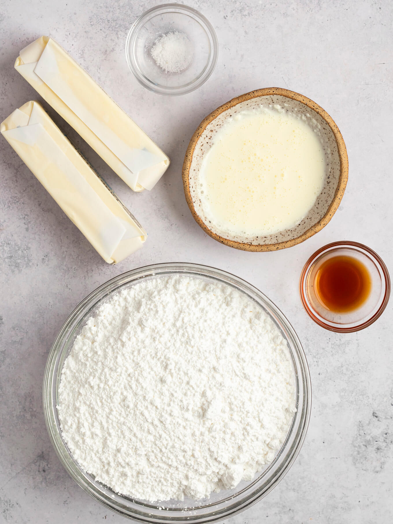 An overhead view of the ingredients needed for brown butter frosting.