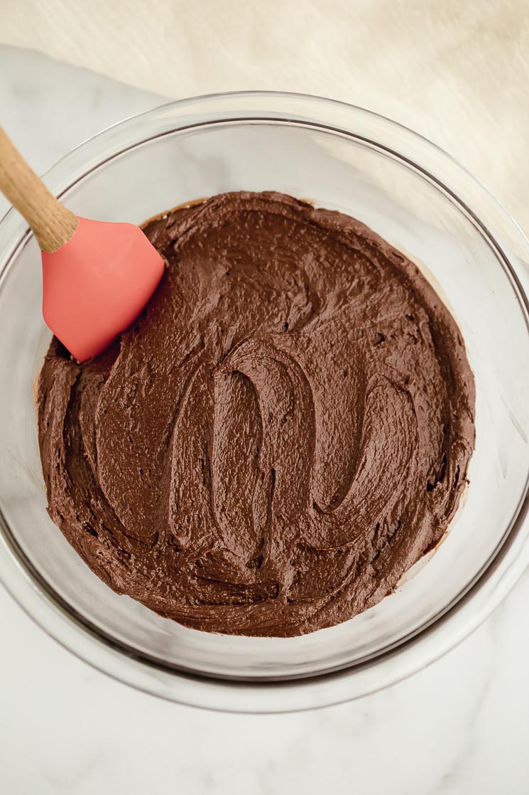 A glass bowl filled with the cookie dough.