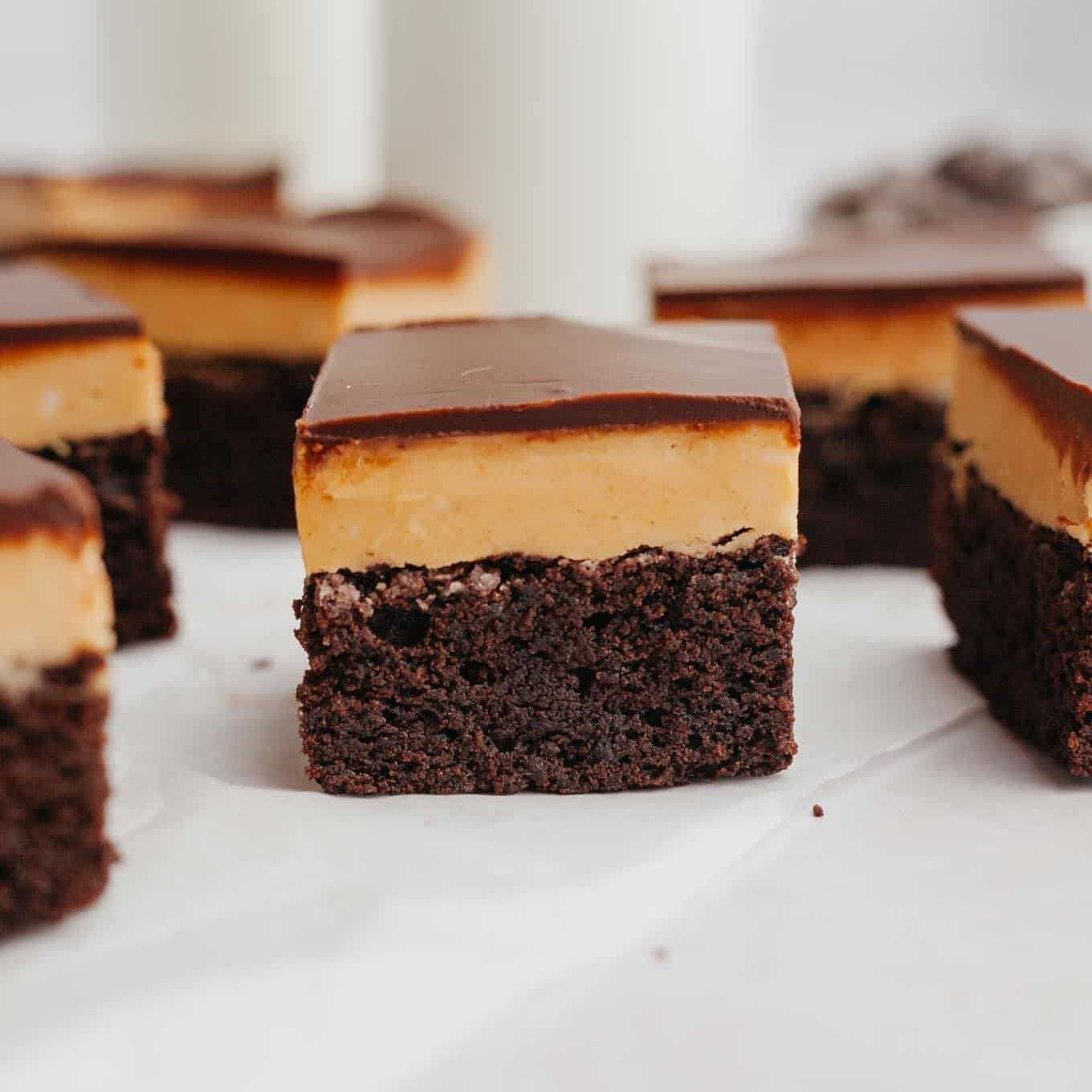 Layered peanut butter fudge brownies, seen from the side. 