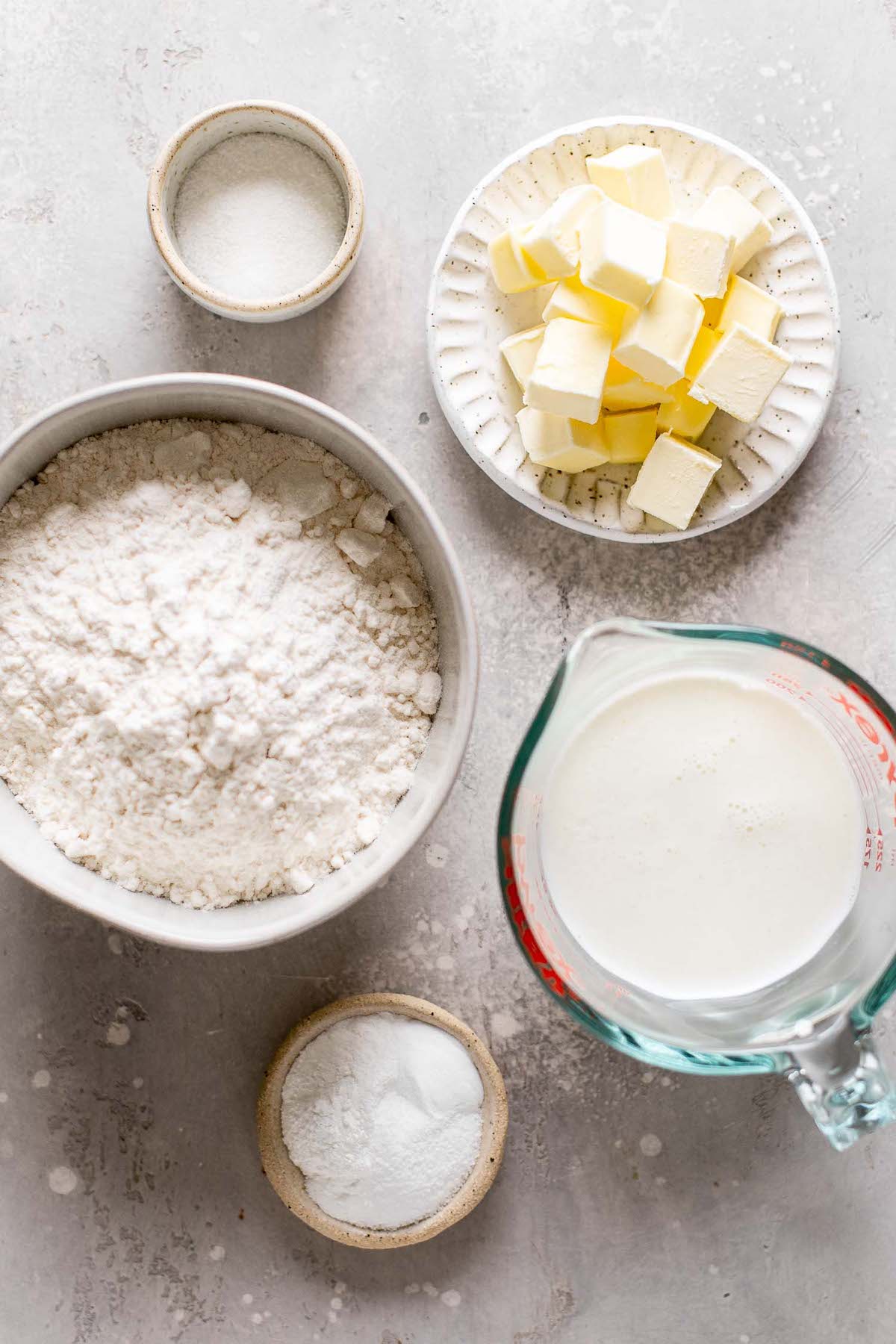 Overhead view of the ingredients needed to make biscuits from scratch. 