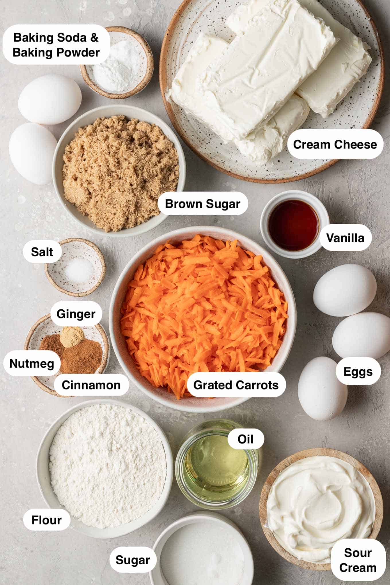 An overhead view of the ingredients needed to make a carrot cake cheesecake. 