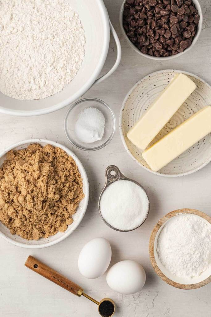 An overhead view of the ingredients needed to make chocolate chip cookies with pudding mix. 