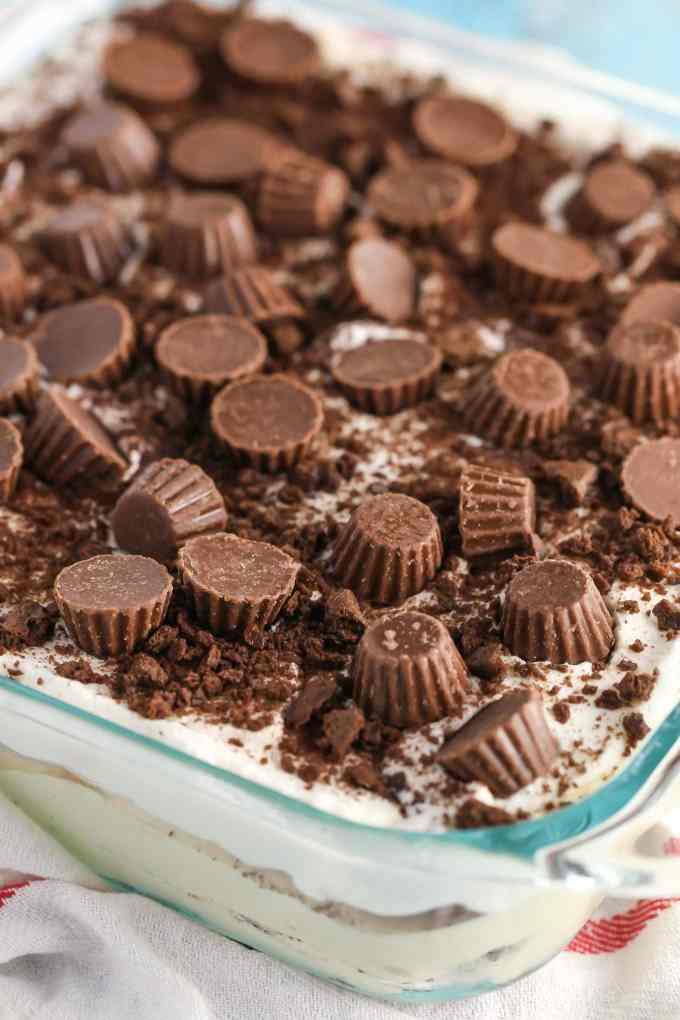 A no-bake chocolate graham cracker icebox cake in a glass baking dish. 