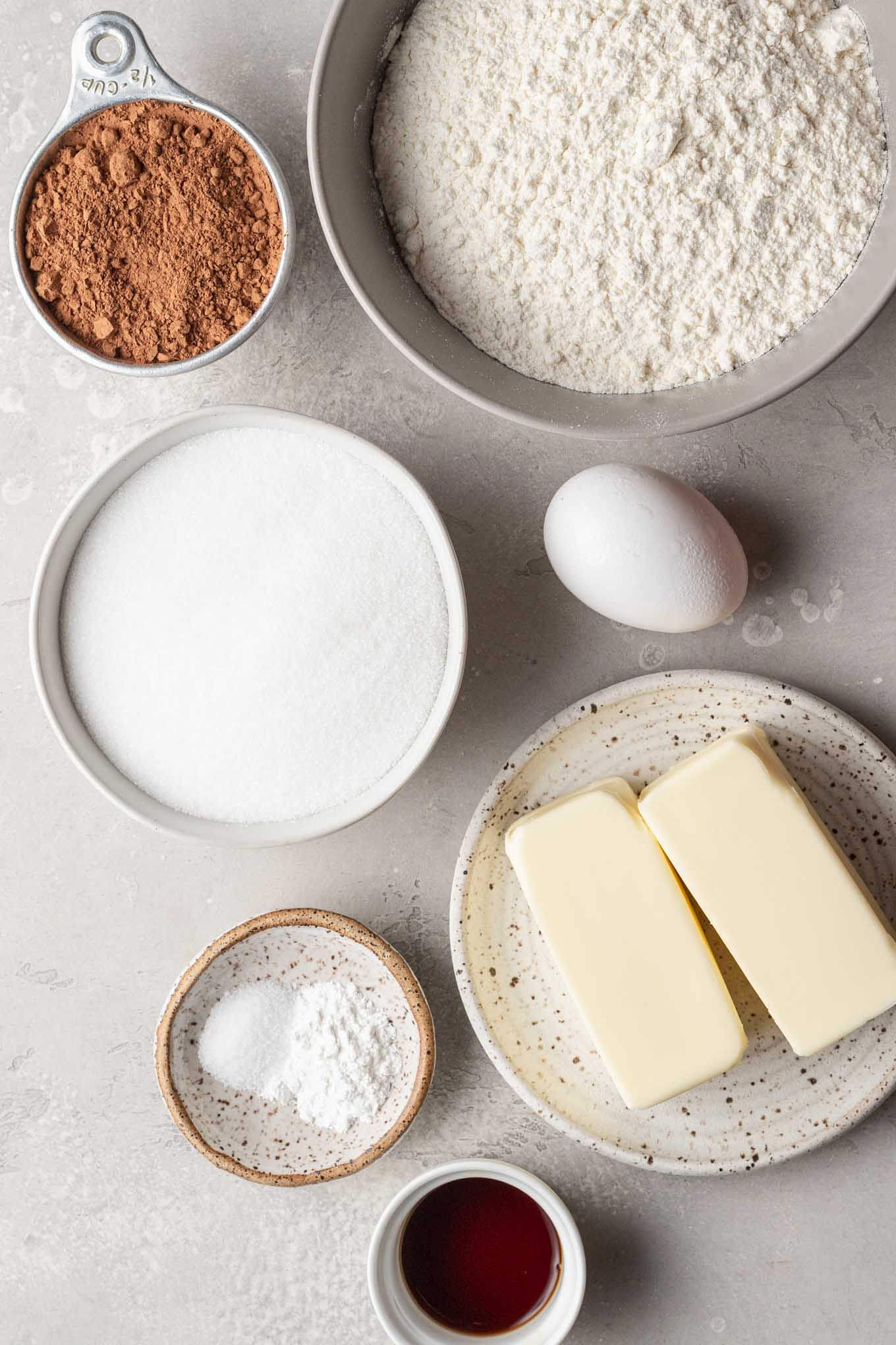 An overhead view of the ingredients needed for chocolate sugar cookies. 