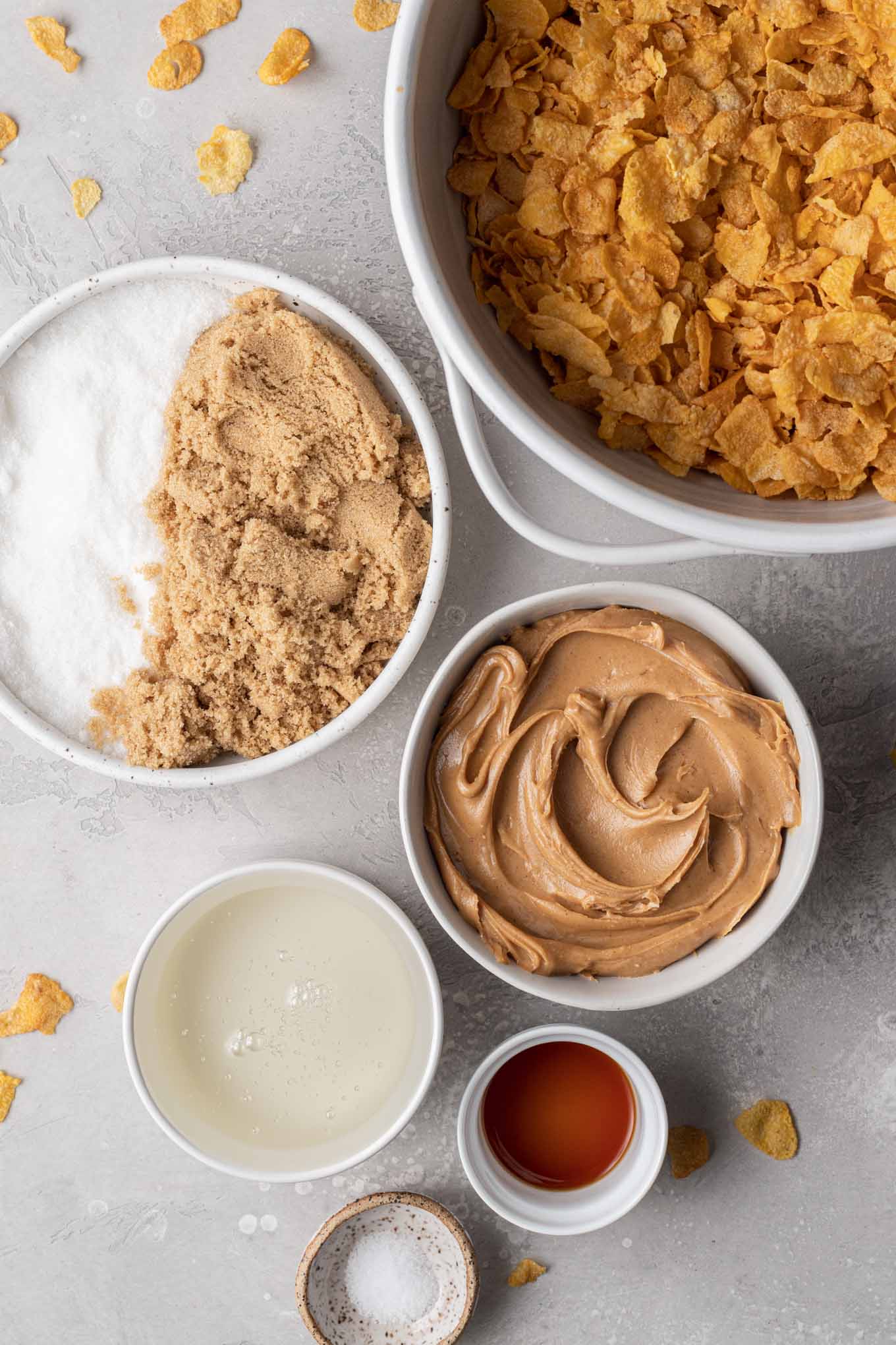 An overhead view of the ingredients needed to make peanut butter Cornflake cookies. 