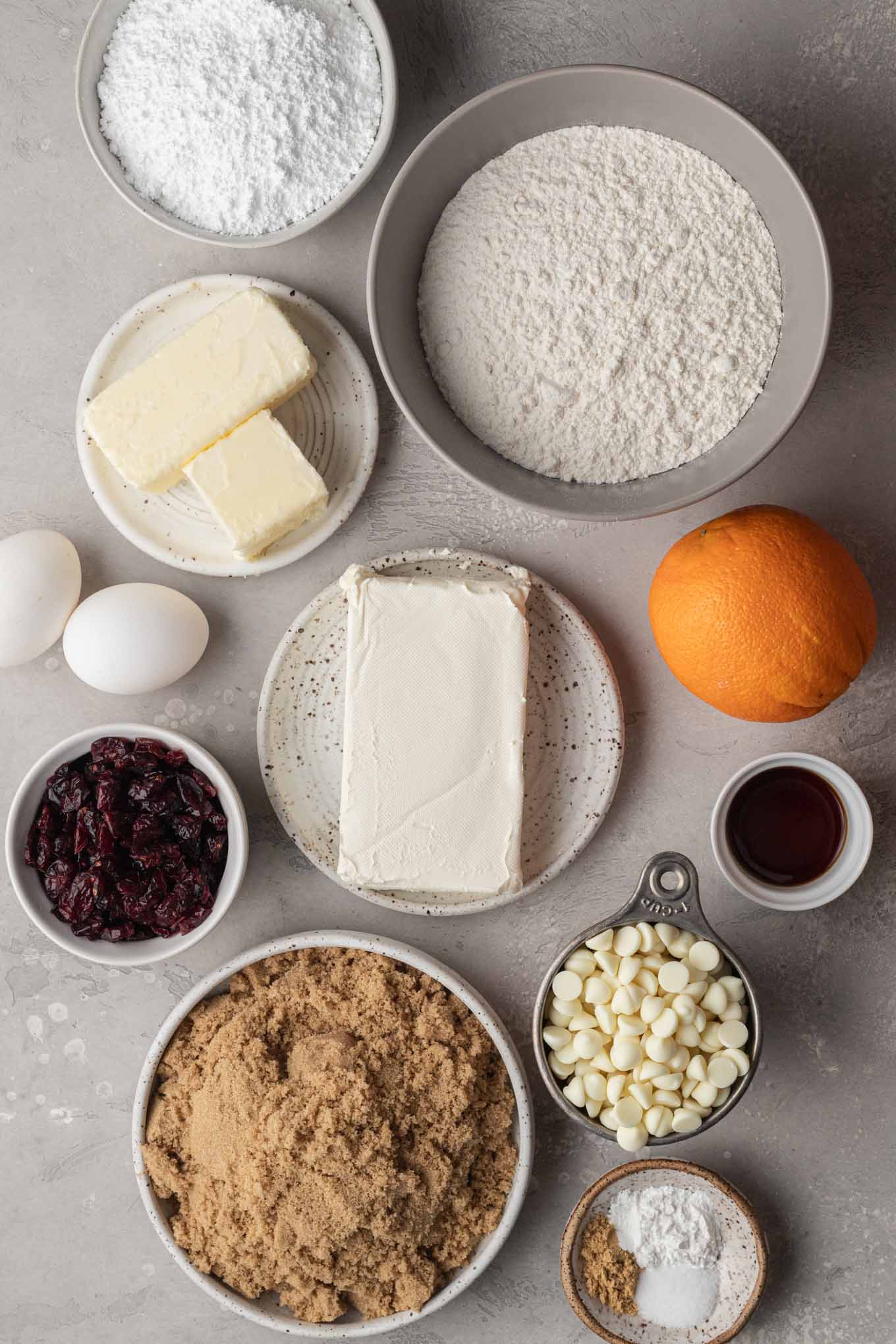 An overhead view of the ingredients needed to make homemade cranberry bliss bars. 