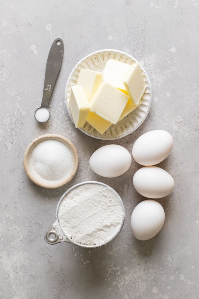 Overhead view of the ingredients needed to make a cream puff recipe. 