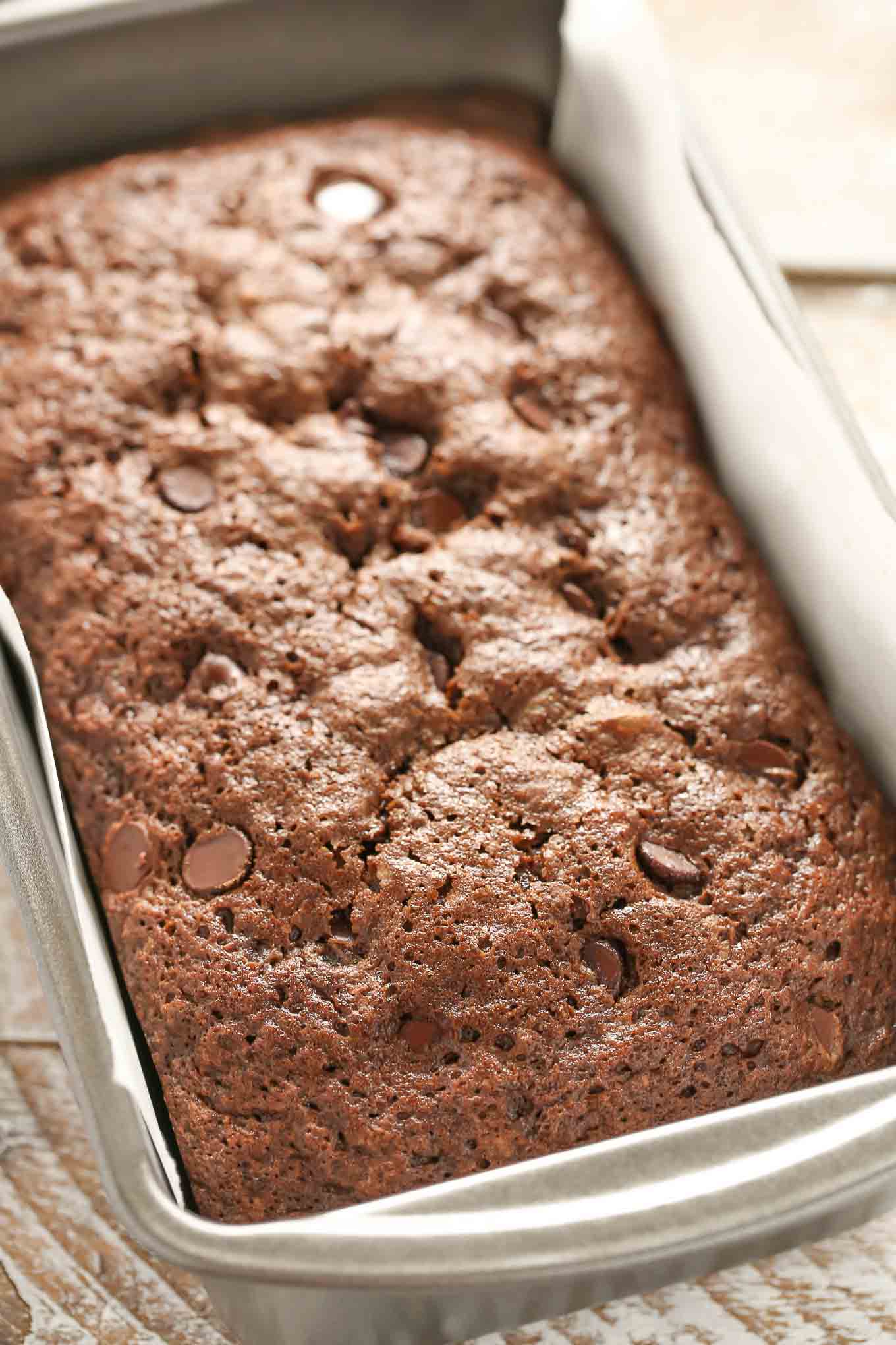 This Double Chocolate Zucchini Bread is incredibly rich, moist, fudgy, and loaded with chocolate chips!