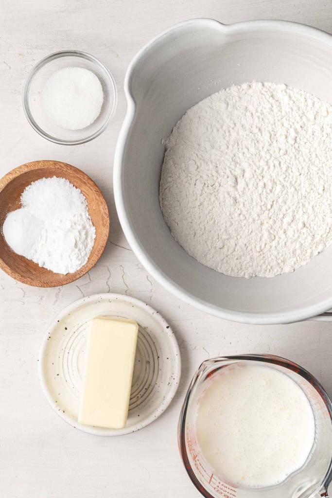 An overhead view of the ingredients needed to make drop biscuits. 