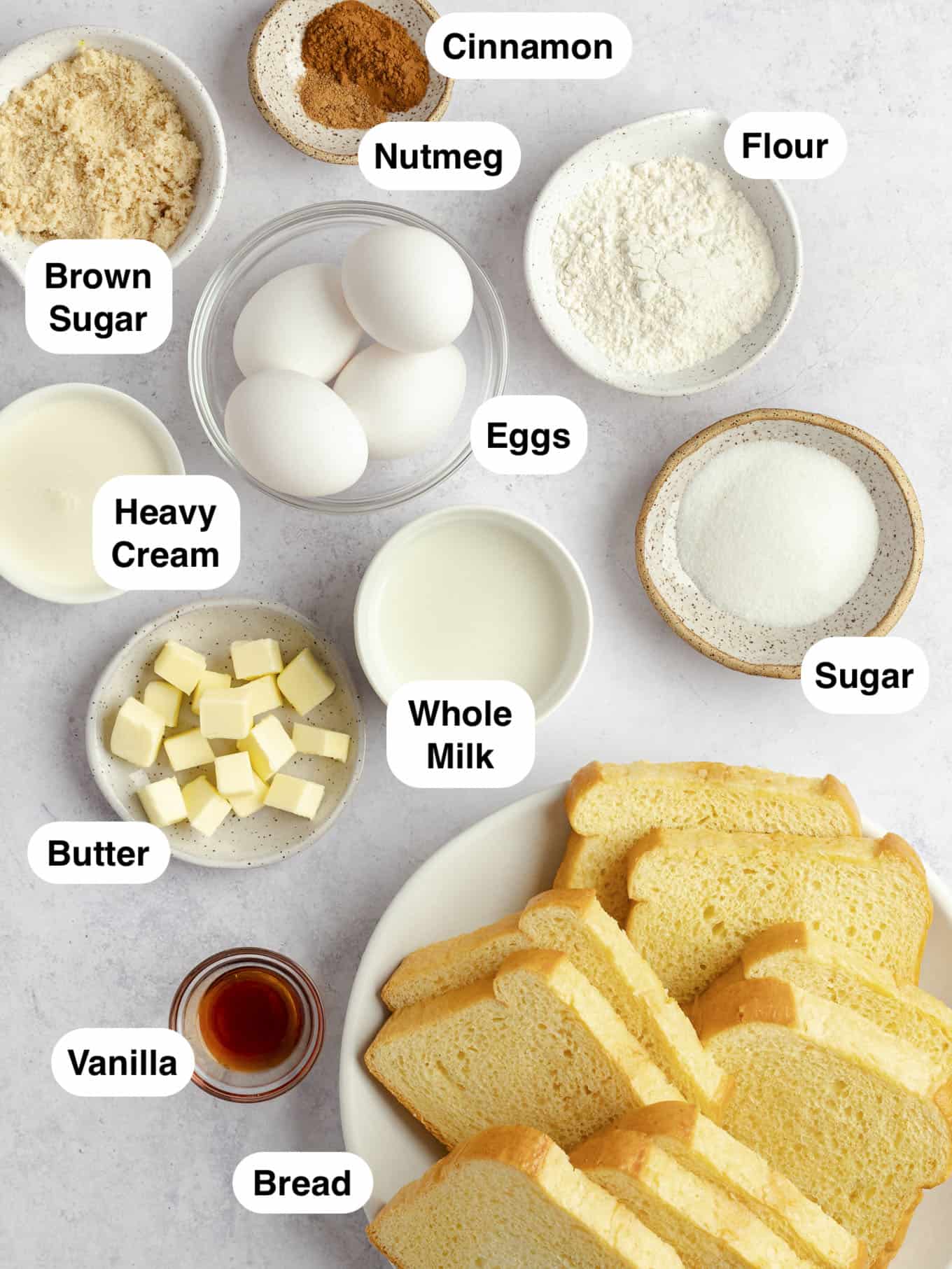 An overhead view of all of the ingredients needed to make French toast muffins.