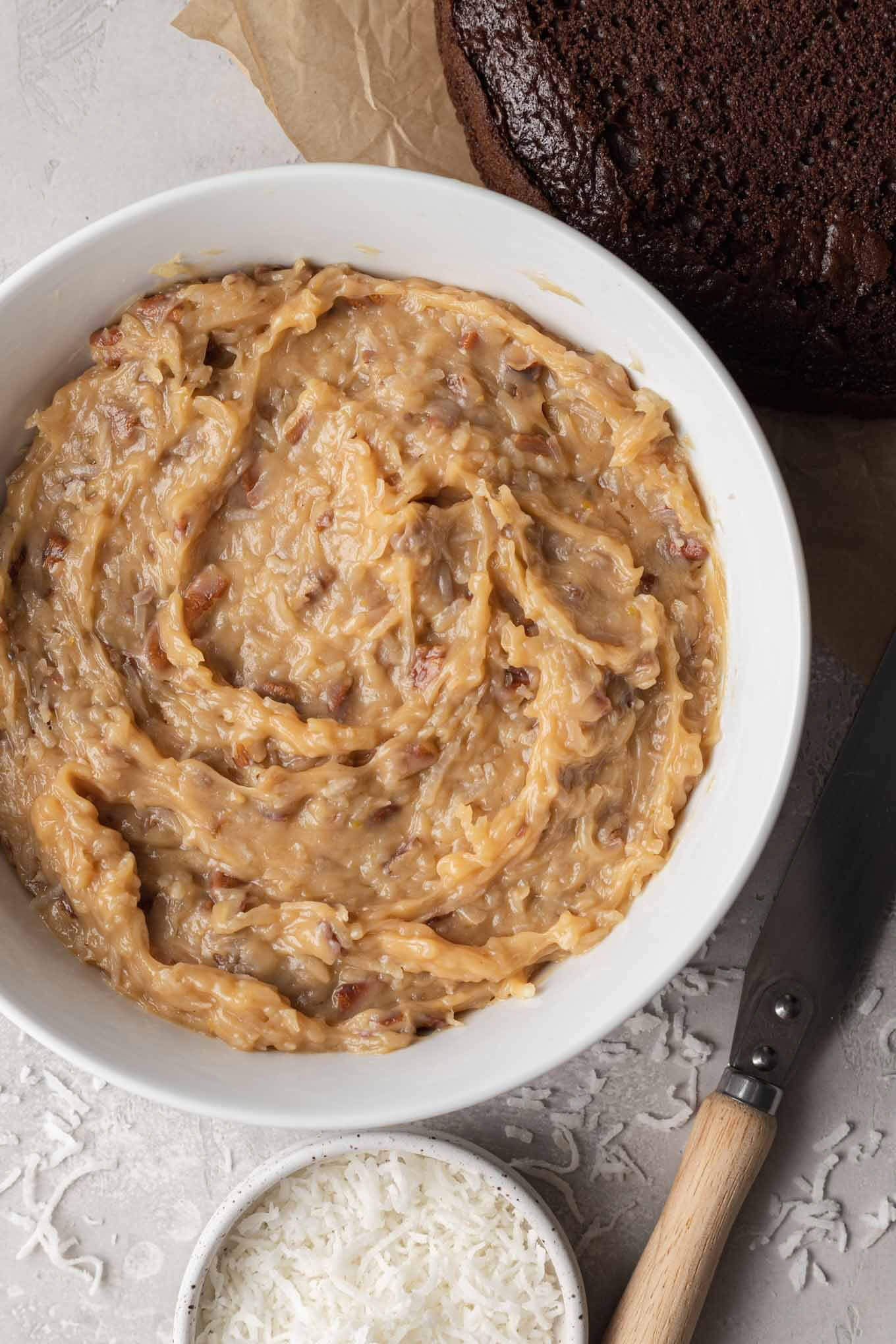 An overhead view of German chocolate cake frosting. 