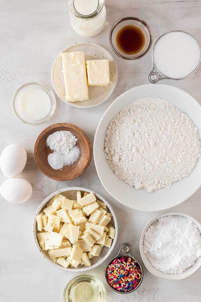 Overhead view of the ingredients needed to make homemade cake pops. 