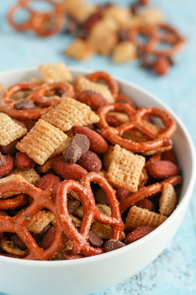 An easy to make snack mix filled with honey, pretzels, chocolate, almonds, and more! This Honey Almond Snack Mix makes a perfect snack for any party or occasion!