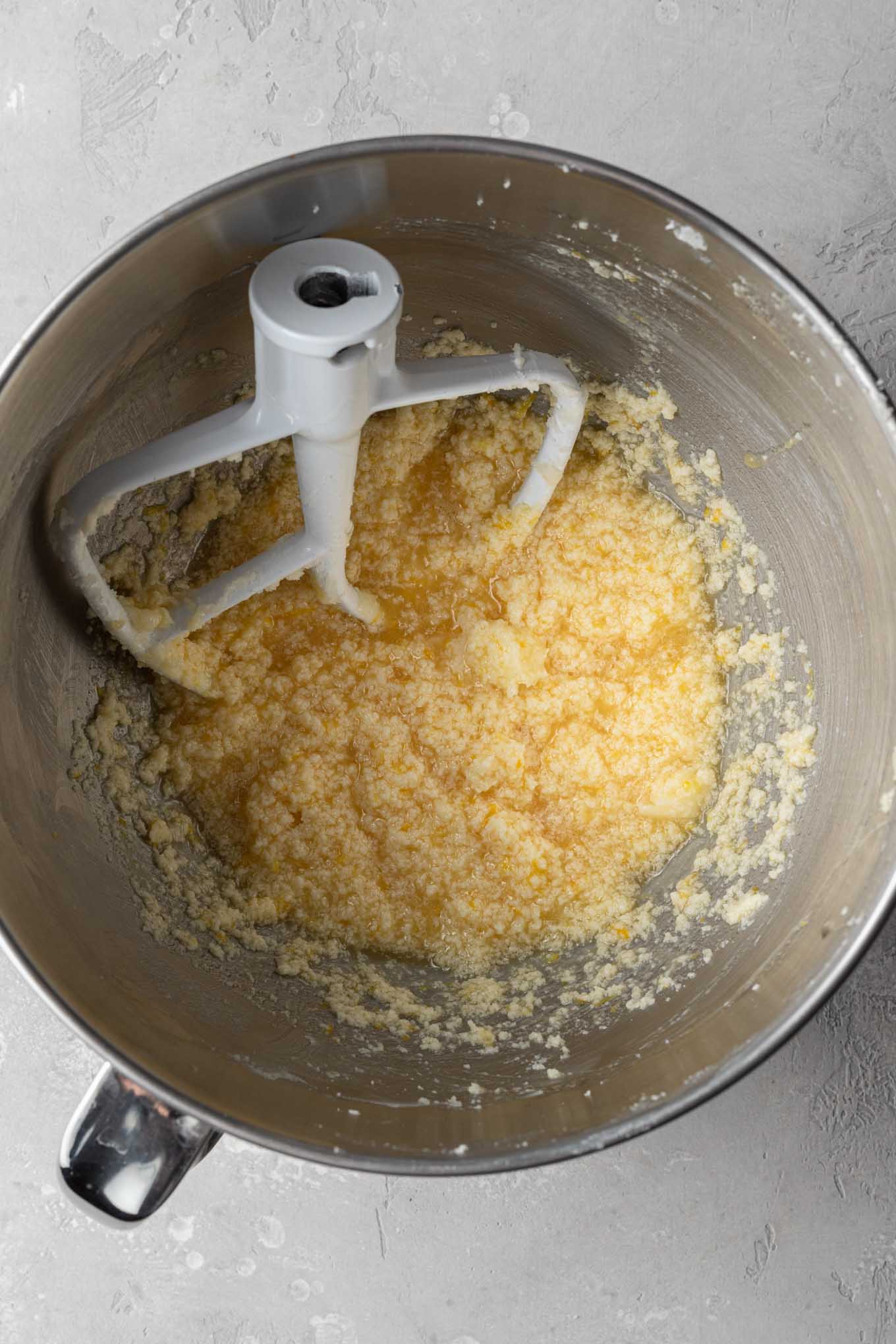 An overhead view of the wet ingredients needed for lemon cupcakes. 