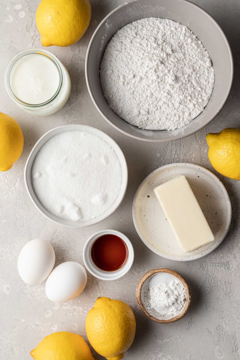 An overhead view of the ingredients needed to make filled lemon cupcakes. 