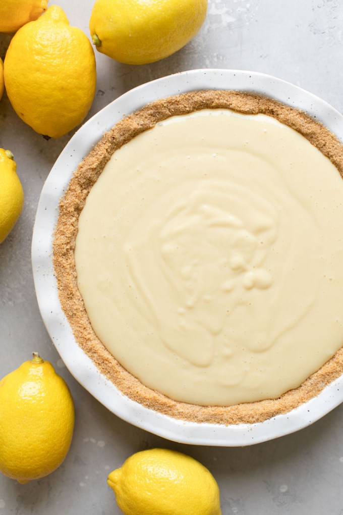 The finished pie filling in the graham cracker crust ready to be put into the oven.