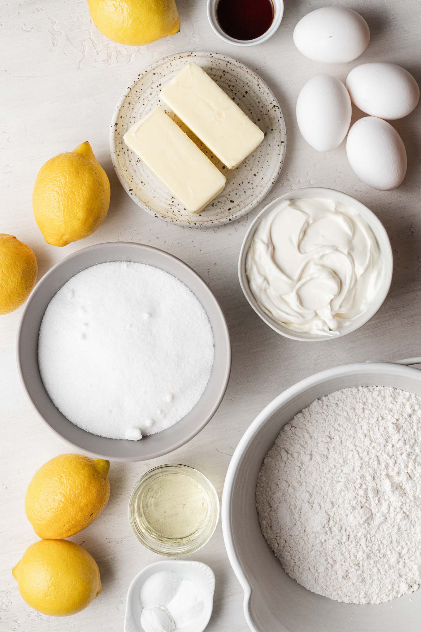 An overhead view of the ingredients needed to make a lemon glazed pound cake. 