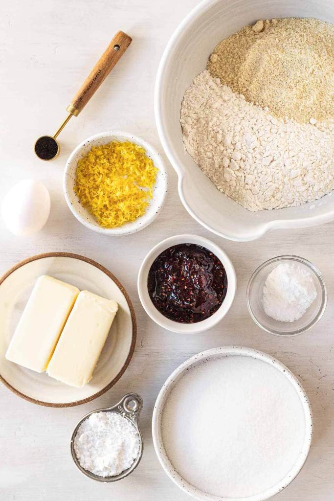 An overhead view of the ingredients needed to make raspberry linzer cookies. 