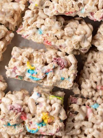 An overhead view of several Lucky Charms treats laying on their side.