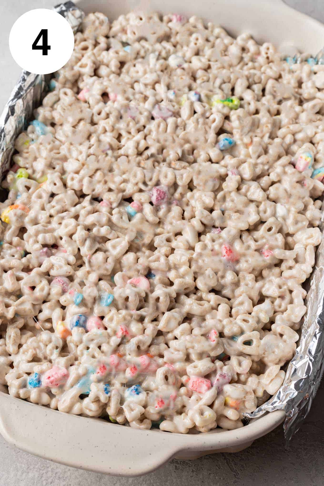 An overhead view of a pan of Lucky Charms treats. 