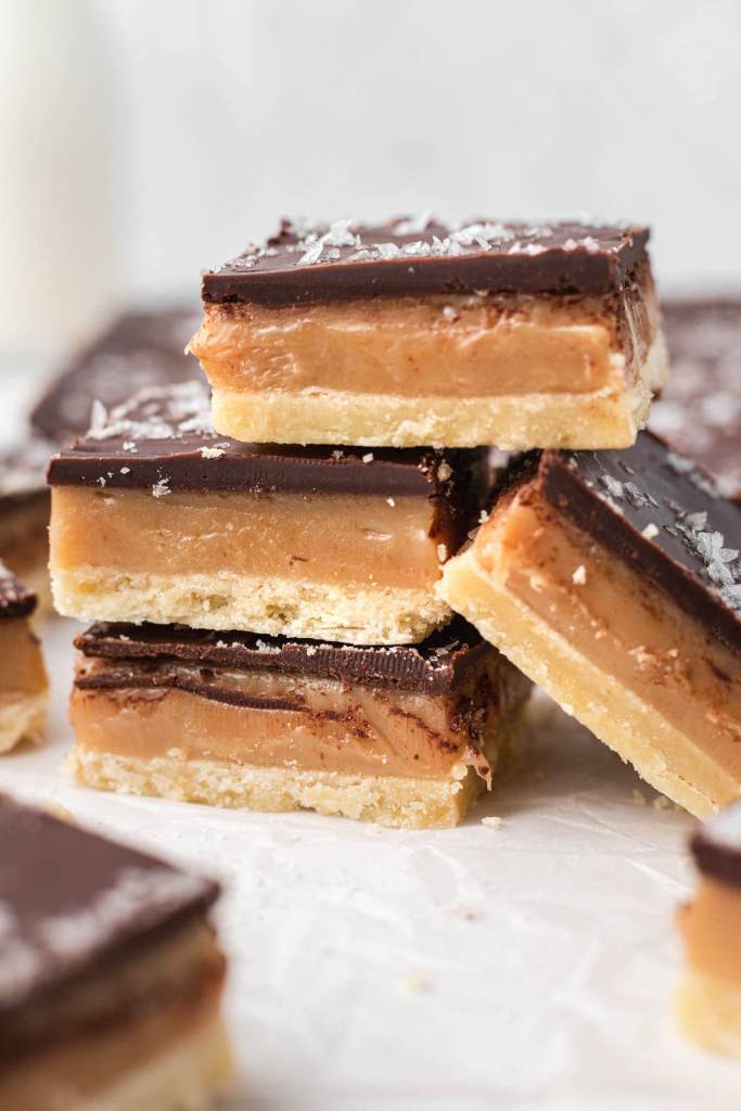 A stack of millionaire bars. Another bar is leaning against the stack.