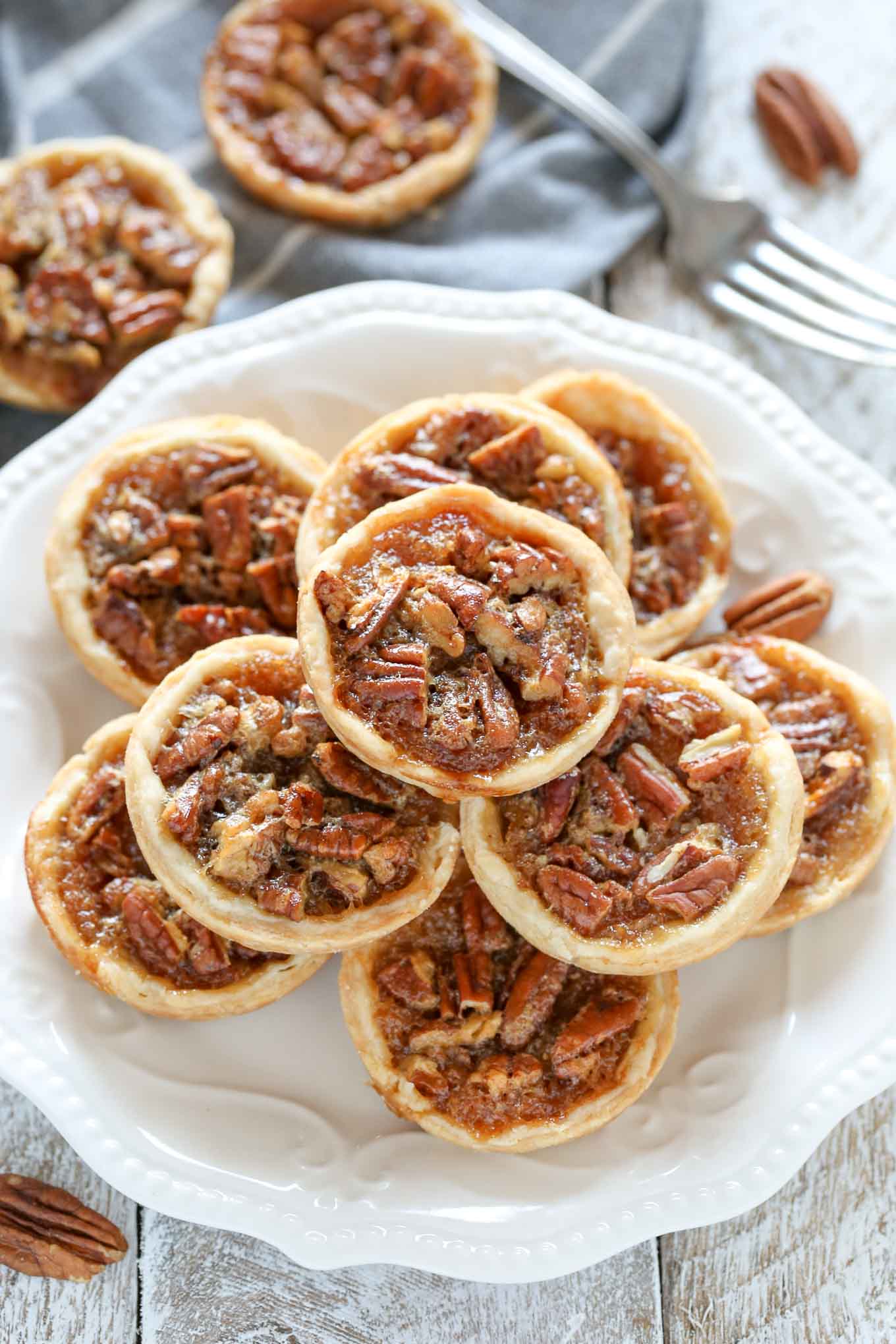 These Mini Pecan Pies are easy to make and can also be made ahead of time. These are the perfect mini treat for Thanksgiving too! 