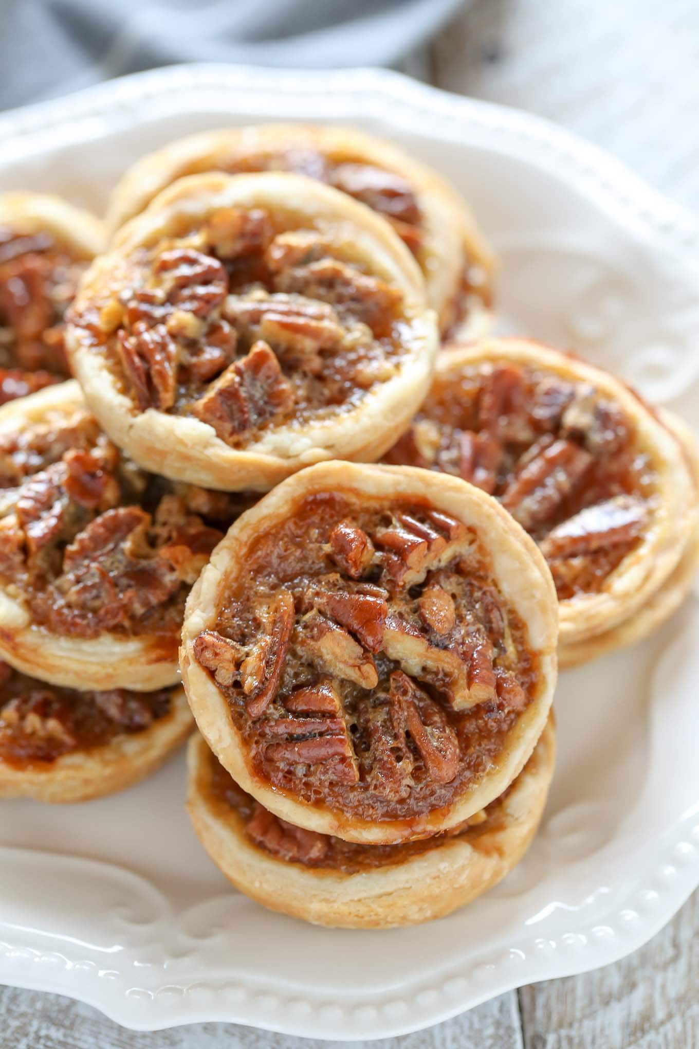 These Mini Pecan Pies are easy to make and can also be made ahead of time. These are the perfect mini treat for Thanksgiving too! 