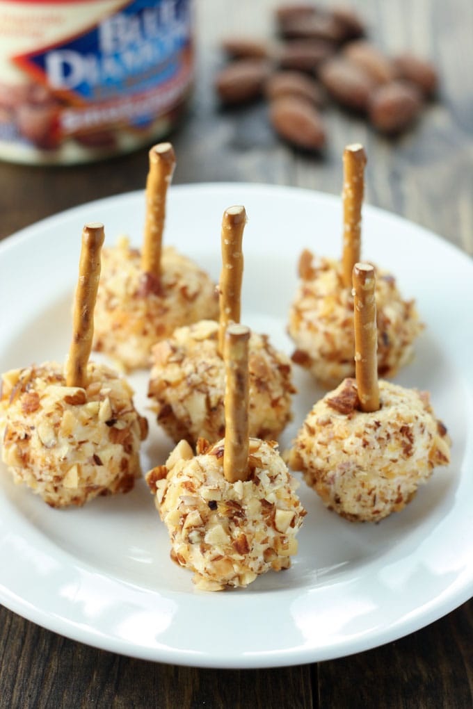 Easy to make mini cheese balls coated in Blue Diamond Smokehouse Almonds. These make a great football or holiday party appetizer!