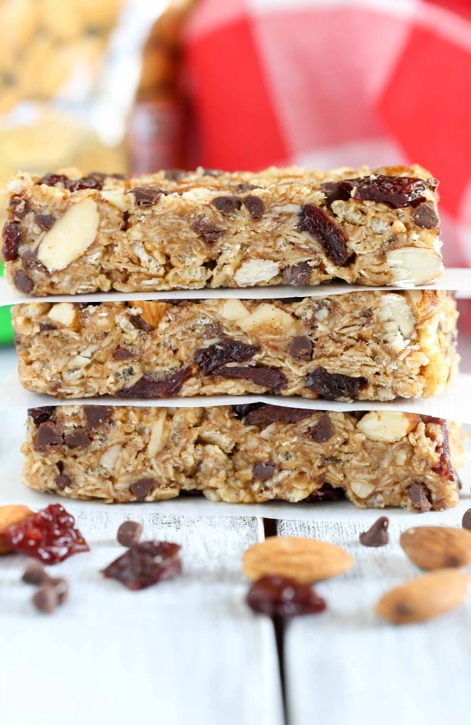 A stack of three chocolate chip almond butter granola bars.