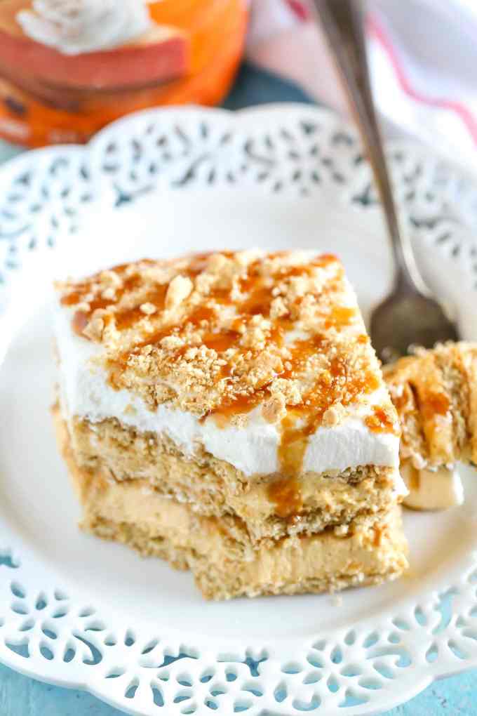 Layers of graham crackers, no-bake pumpkin spice cheesecake filling, and caramel topped off with homemade whipped cream. This No-Bake Pumpkin Caramel Icebox Cake is an easy and delicious fall dessert!