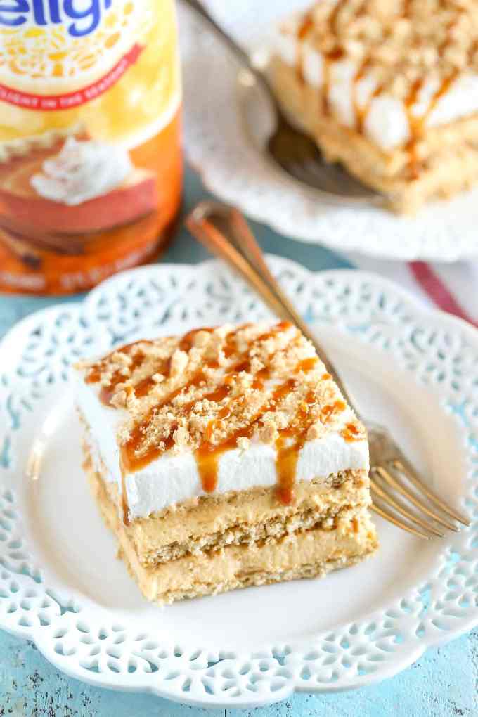 Layers of graham crackers, no-bake pumpkin spice cheesecake filling, and caramel topped off with homemade whipped cream. This No-Bake Pumpkin Caramel Icebox Cake is an easy and delicious fall dessert!