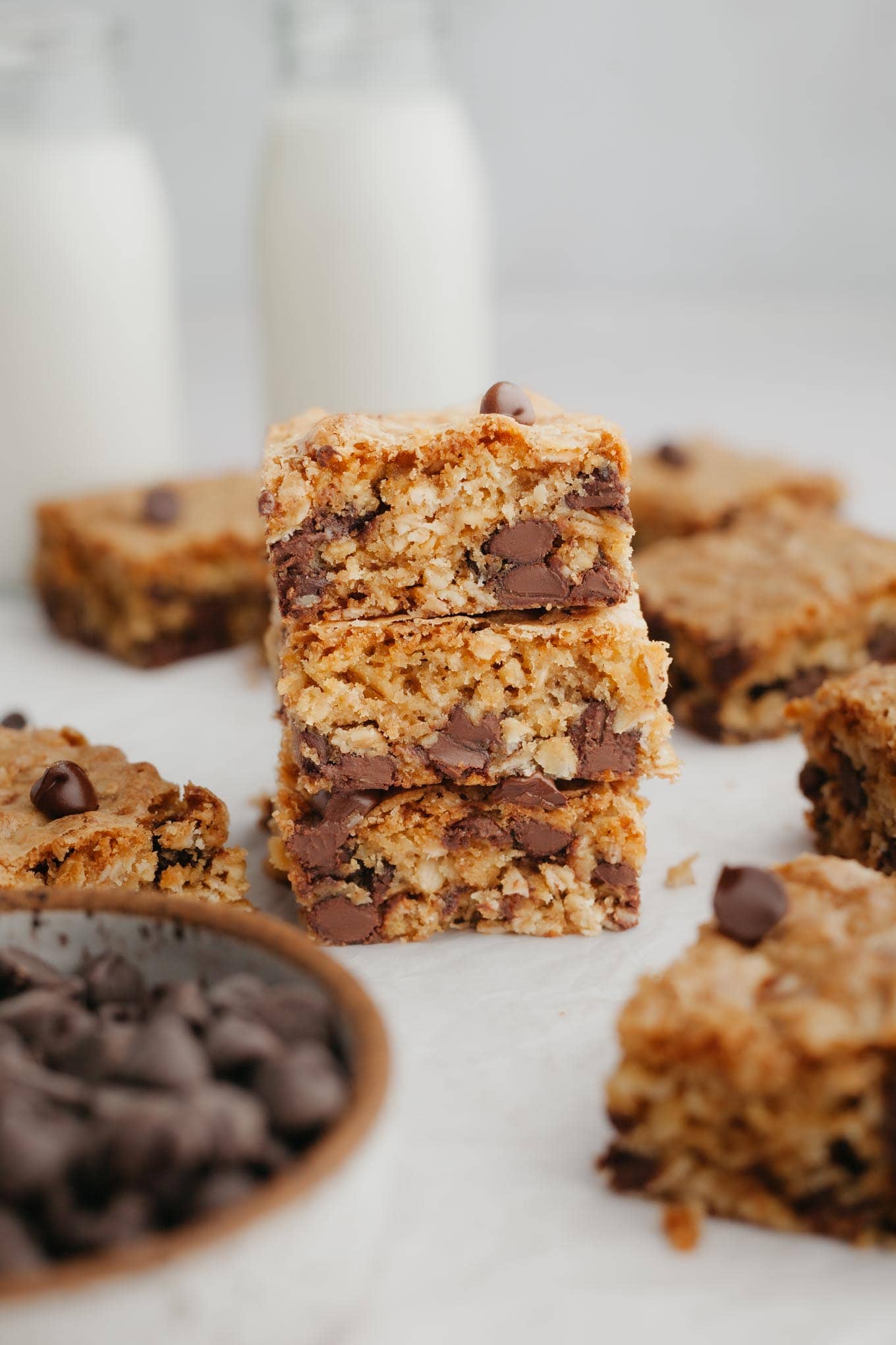 A stack of three oatmeal cookie bars, seen from the side. 