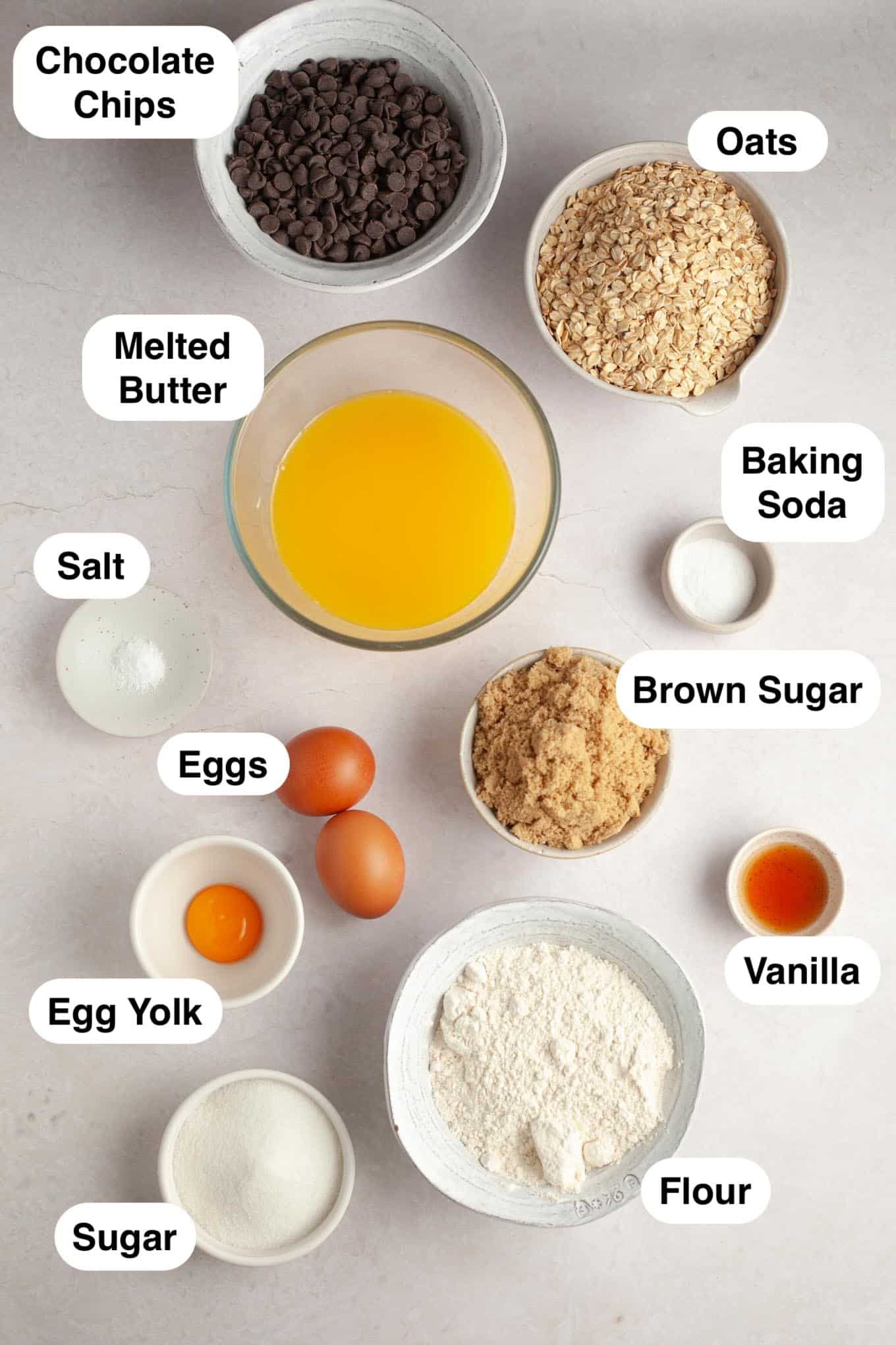 An overhead view of the ingredients for oatmeal bar cookies. 