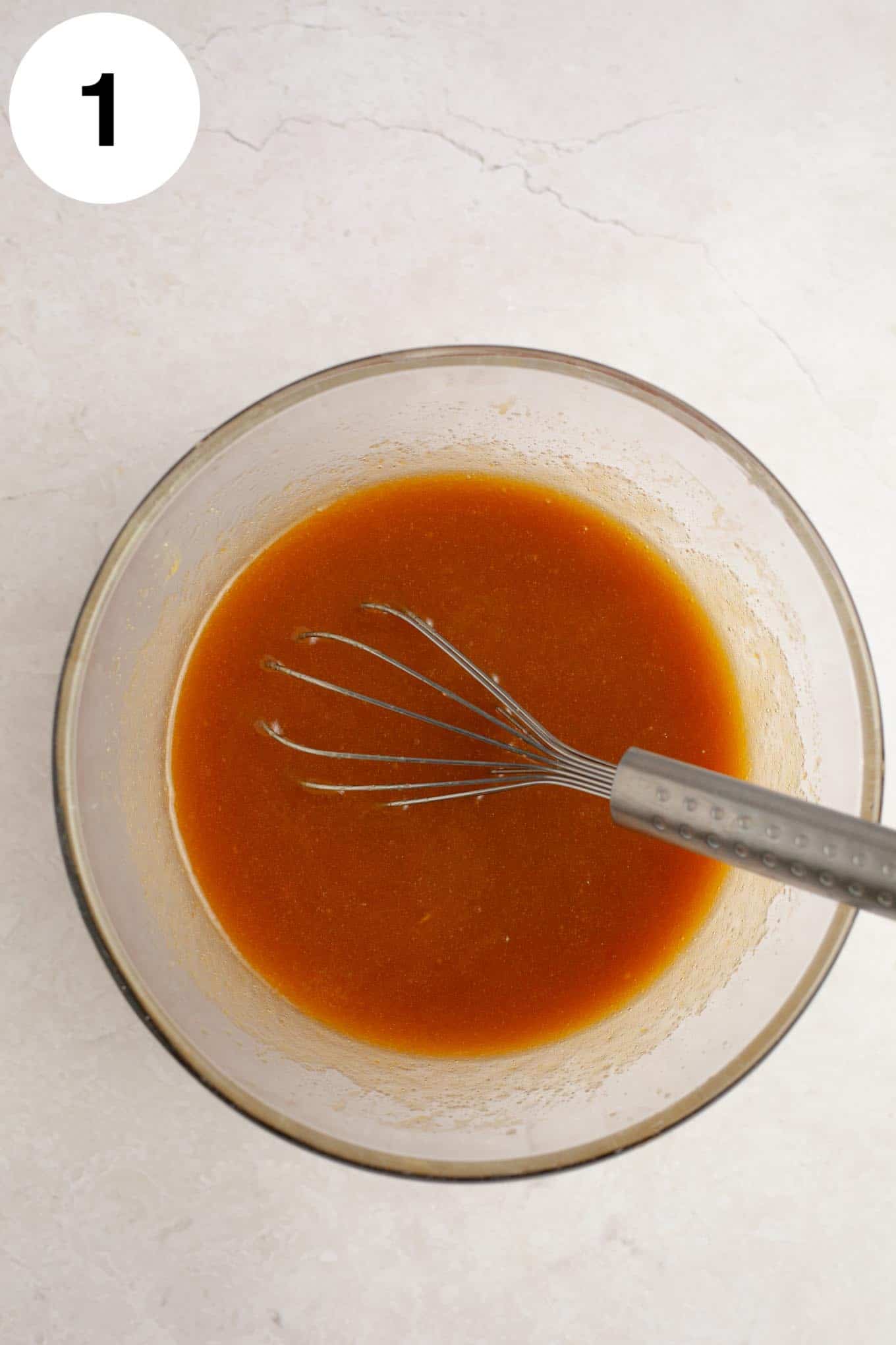 An overhead view of the wet ingredients mixed together.