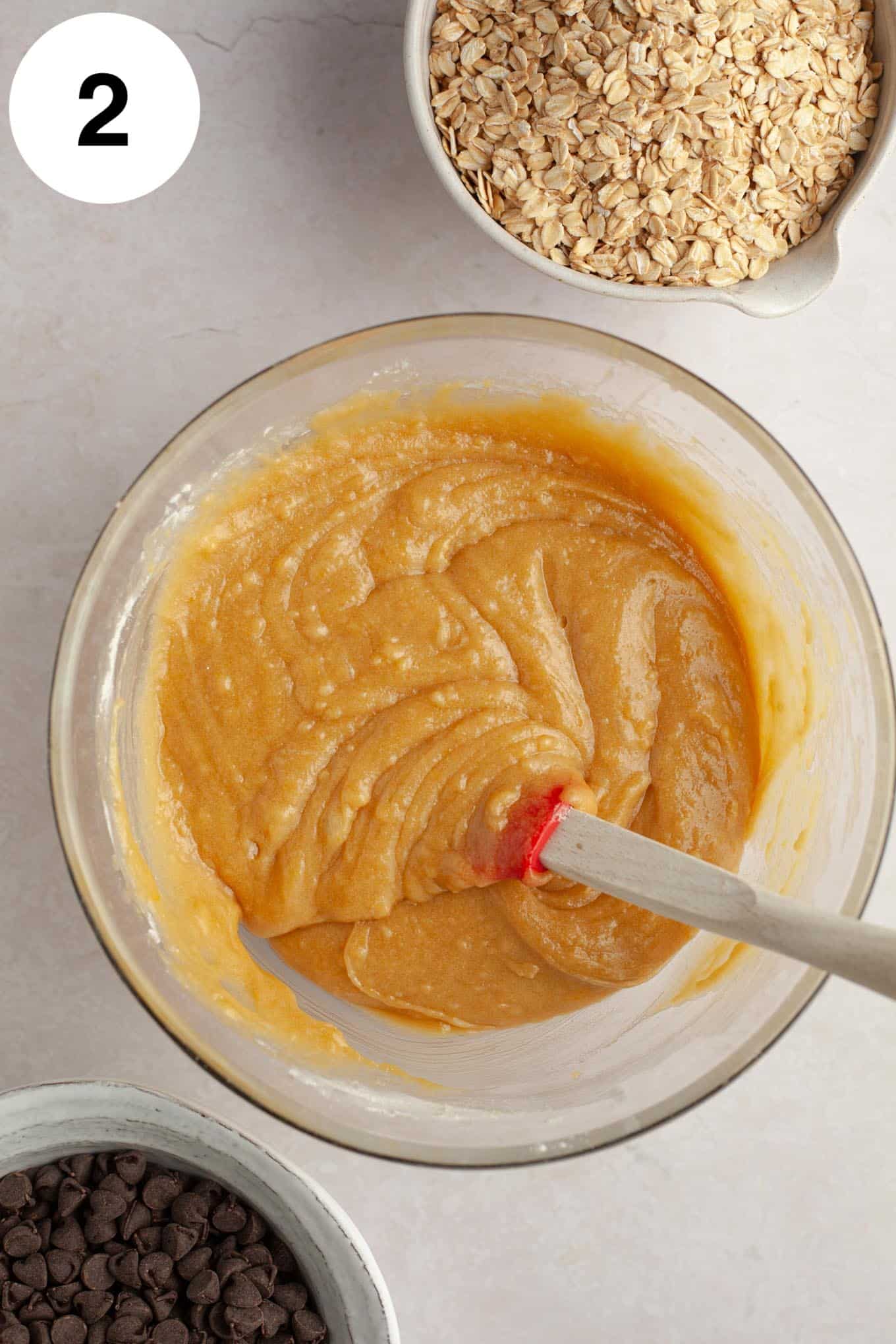 An overhead view of the wet and dry ingredients mixed together.