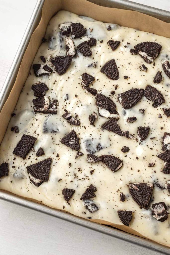 An overhead view of a pan of white chocolate Oreo fudge. 