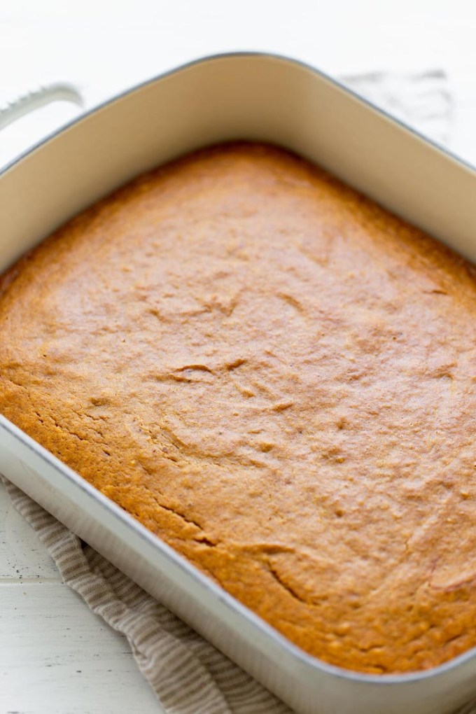 A finished pumpkin cake baked in a 9 by 13 pan.