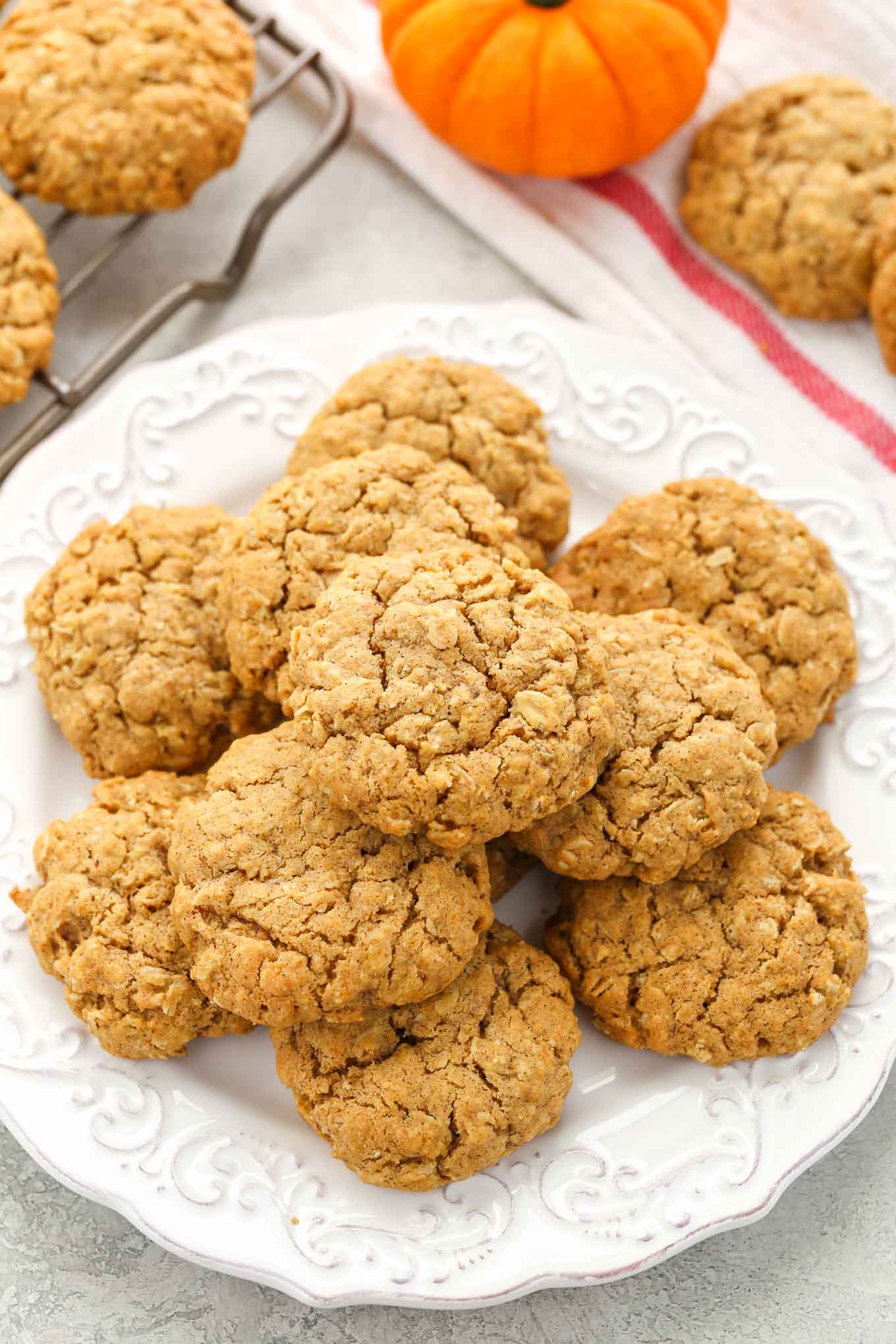 These pumpkin oatmeal cookies are super soft, chewy, thick, and full of pumpkin flavor! The perfect cookie for fall! 