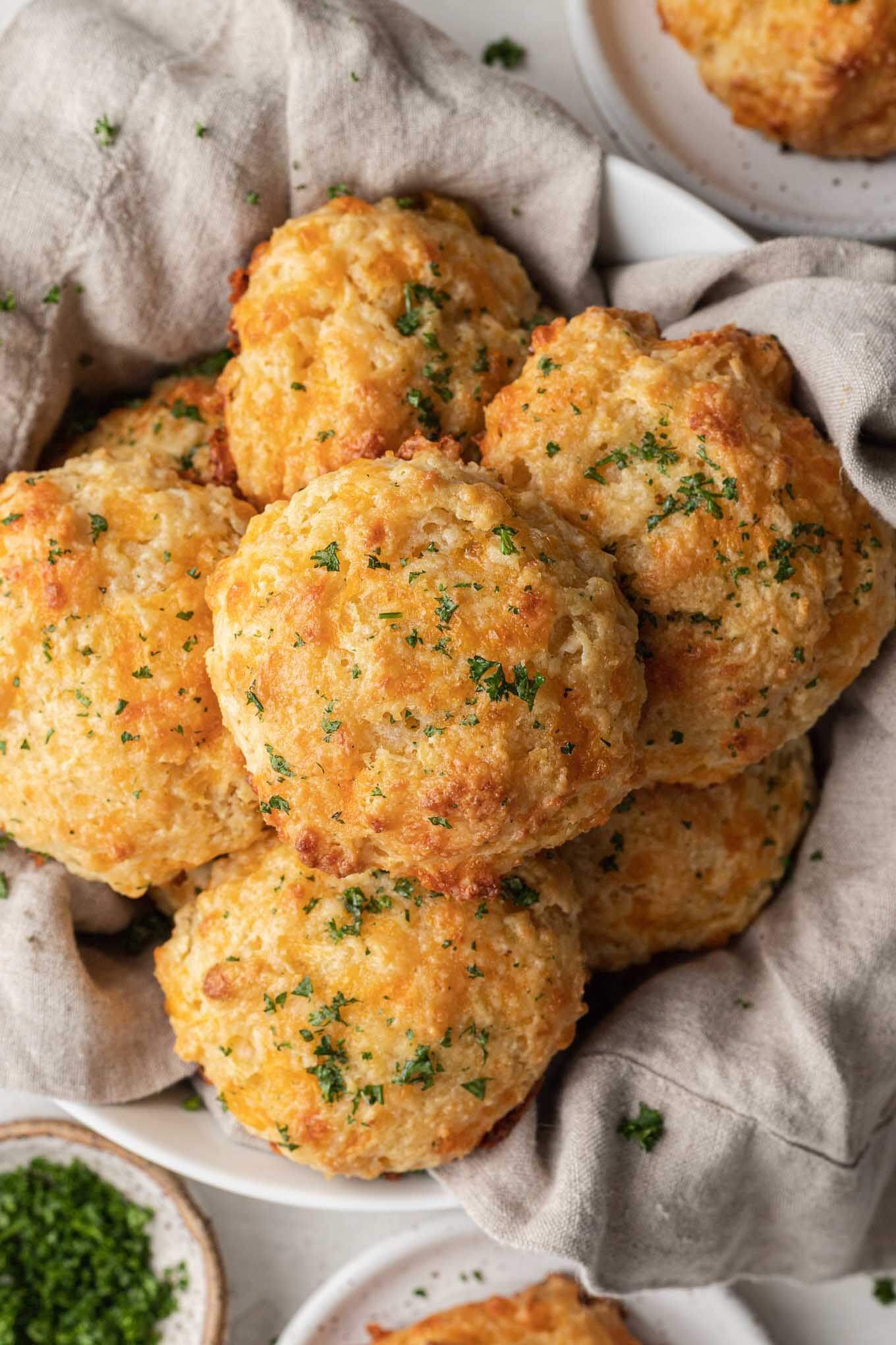 An overhead view of a basket of copycat Red Lobster biscuits. 