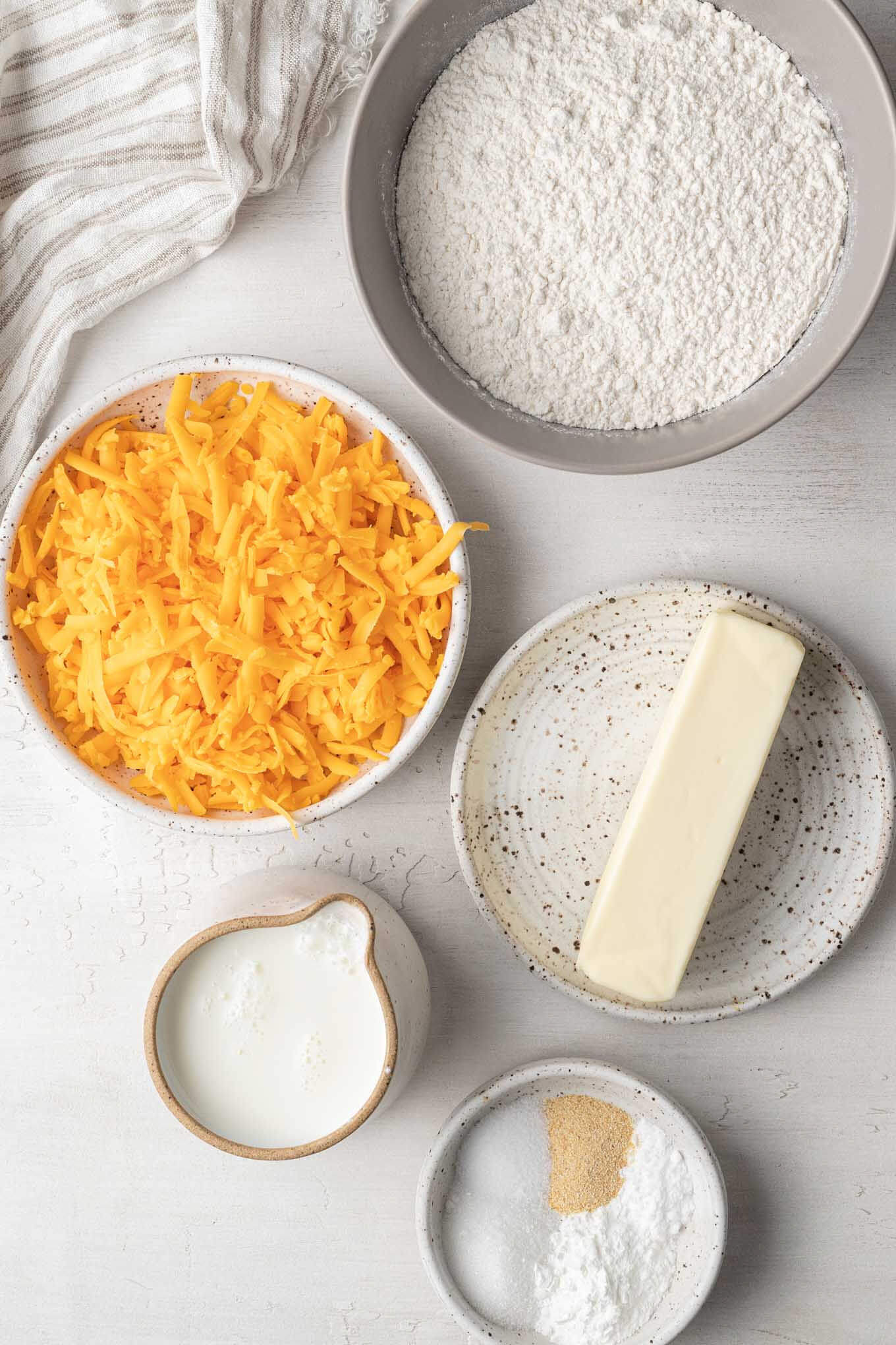 An overhead view of the ingredients for Cheddar Bay Biscuits. 