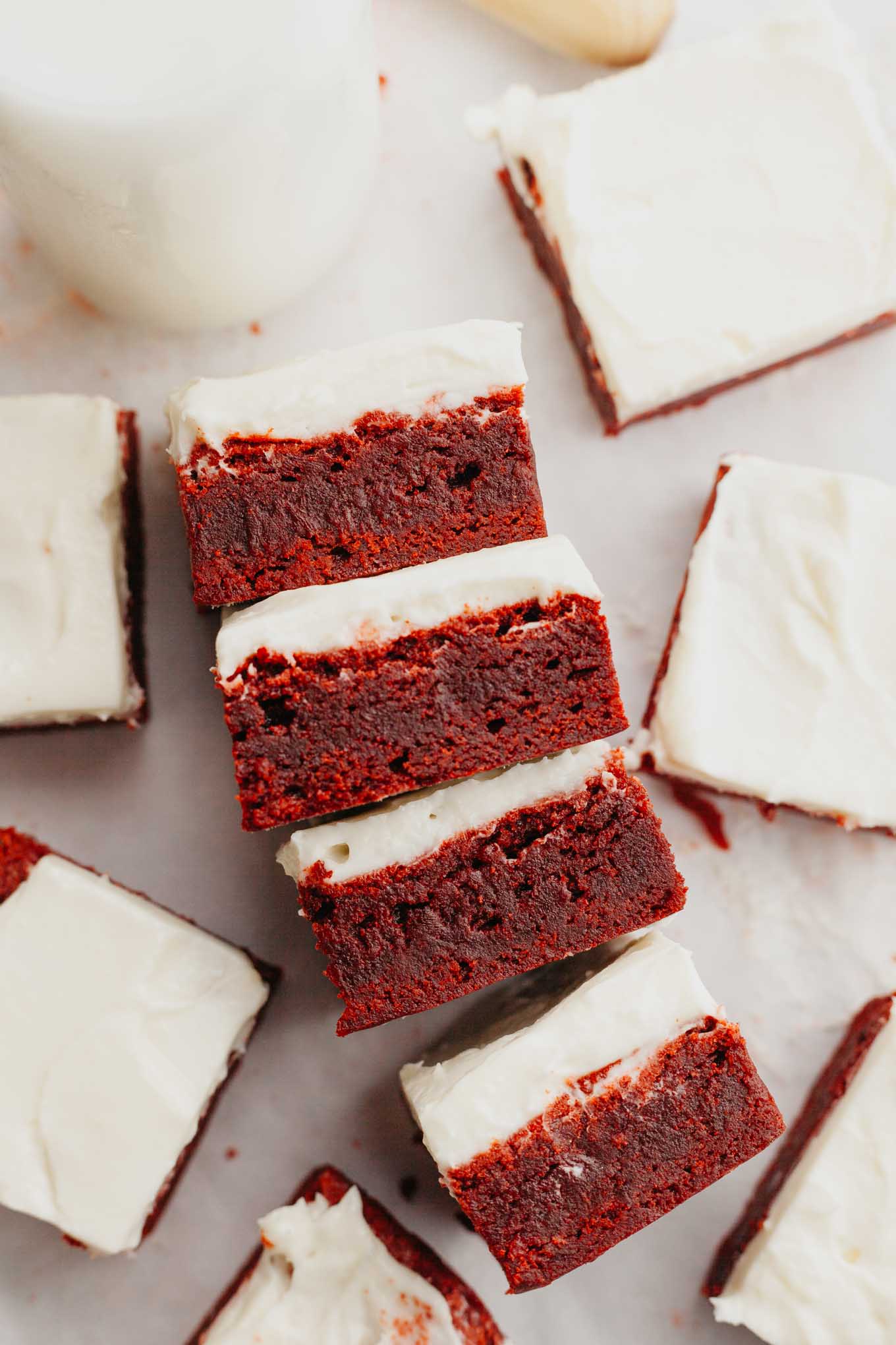 An overhead view of several red velvet brownies laying on their sides.