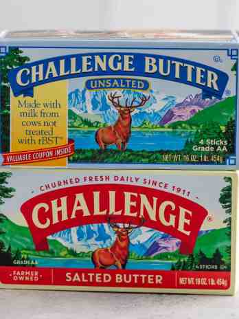 A box of unsalted butter stacked on top of a box of salted butter.