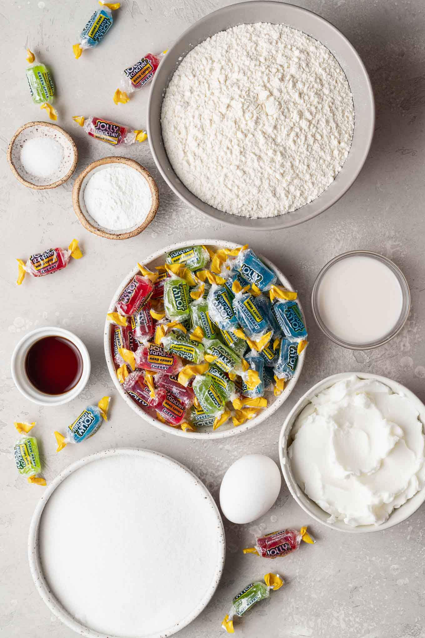 An overhead view of the ingredients needed to make stained glass window cookies. 