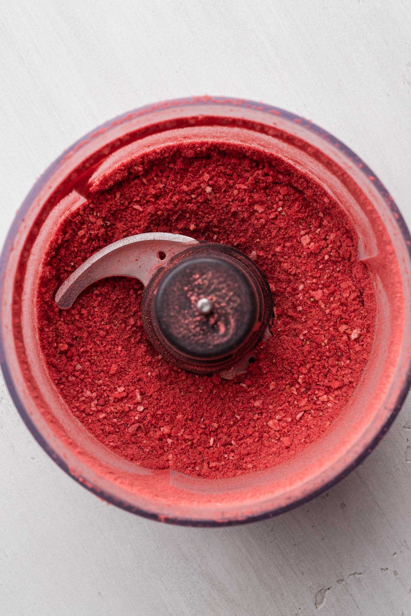 Freeze dried strawberries blended into a fine powder in a food processor.